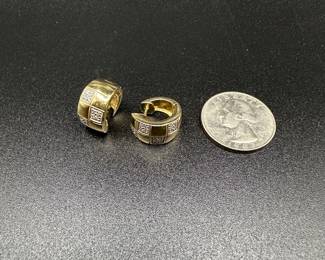 J30 - $375. Pair of 14kt gold Huggies Earrings with small diamond chips. 