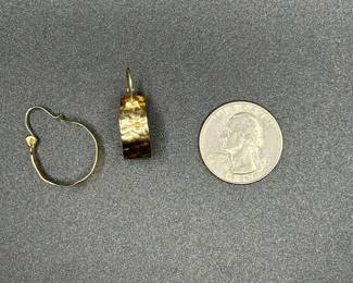 J12 - $175. Pair of 14 kt gold hoops. 