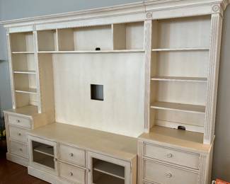 C1 - $350. Ethan Allen Media Center. Moves in at least 6 Pieces. Assembled it is 80" tall x 112" long. Each end piece / bookcase is 24.5" wide x 80" tall. Sides are finished so they can be used independently. 