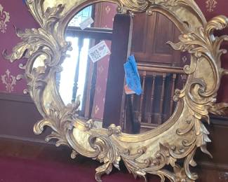 This is an exquisite Gilt and Gesso Mirror... Very unusual shape. 