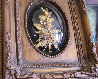 Floral art under domed glass