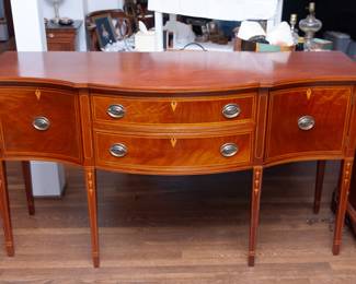 Nice serpent front sideboard