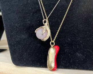 Vintage Avon hot dog necklace.