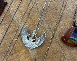 Sterling and crystal. She will protect you from bad music.