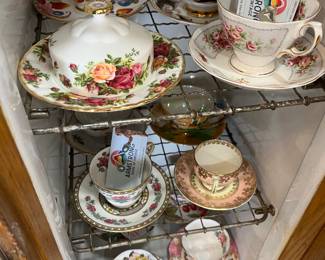 Tea cups and saucers.  Love.