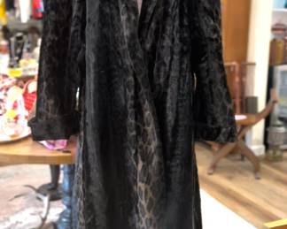 Faux fur and incredible. Size 14 I believe.