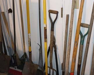 Assortment of Rakes, Shovels, Pitchforks