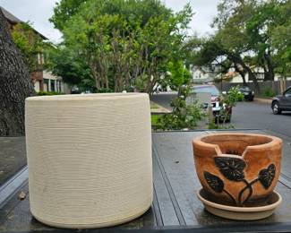 Two very nice pots for plants. Suitable for indoors or outdoors
The white one is 12" tall x 13" wide. The brown one is 7" tall x 9" wide.