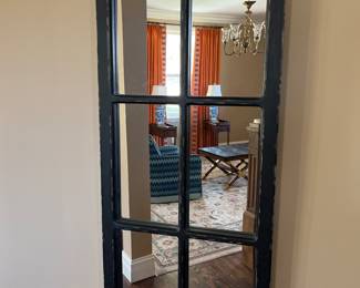 Living Room:  This newer "window panel" mirror measures 20” x 48.”
