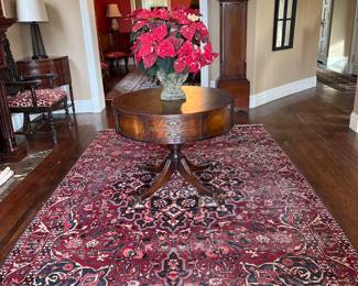 Foyer:  Welcome to this wonderful 3-story home in Clayton!  The large entryway includes an antique drum table, gorgeous rug, tall case clock, corner cabinet, and newer lamp.  Closer photos follow.