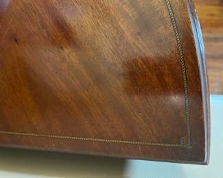 Foyer:  The top of the corner chest also has string inlay.