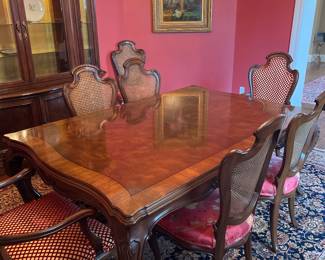 Dining Room:  A classic KARGES dining room table and chairs are shown WITHOUT its three 20" leaves and only six of its ten chairs.  As shown, the table measures 47" x 71" x 29-1/2" tall.  The next photo shows the table with all three leaves inserted.