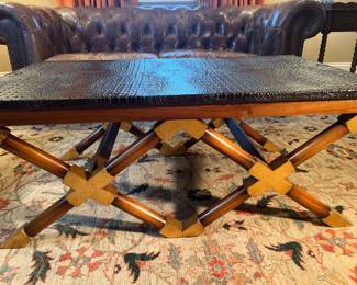 Living Room:  The quality JOHN-RICHARD campaign style coffee table with faux alligator top measures 49" x 29" x 20" tall.  A closer photo of the top follows.