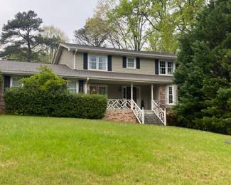Please do not walk in grass, yard uneven.  Enter through the garage.