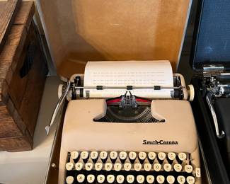 #21	Misc.	Smith Corona Typewriter in Case	 $20.00 			
		
