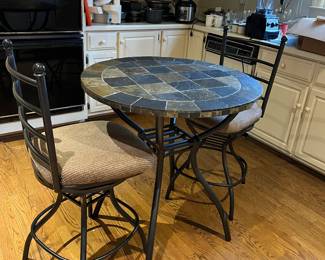 #149	Table	Bar height bistro table with 2 chairs.  Marble tile top, metal base.  33x36  Swivel chairs	 $100.00 			
