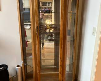#93	Cabinet	Display cabinet with 3 glass shelves , mirror back, one door.  36x18x72	 $125.00 			
