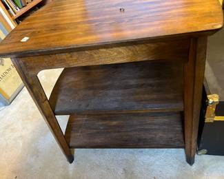 #204	Table	End table with two shelves, 26x22x23	 $100.00 			
