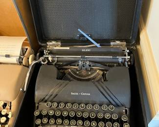 #22	Misc.	Smith Corona Typewriter in Case w/round Glass Keys	 $50.00 			
