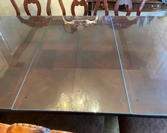 #8	Table 	Double Pedestal Dining Table w/2 leaves & 10 chairs - 68-92x42x30 - has glass protect for 3 separate Pieces 	 $525.00 
