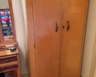 #184		Vintage armoire with two doors. inside 6 shelves, 2 glass door cabinets 36x18x72	 $125.00 
