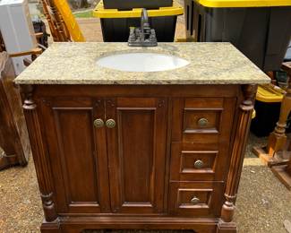 
#11	Vanity	Wood Vanity w/ 3 drawers & 2 doors w/marble top w/undermount sink - 37x32x34	 $275.00 
