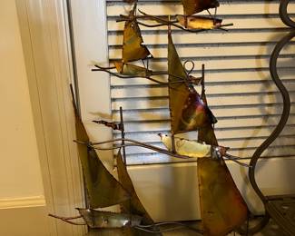 #210	Art	Brass and copper metal sculpture of ships    18x27	 $30.00 
