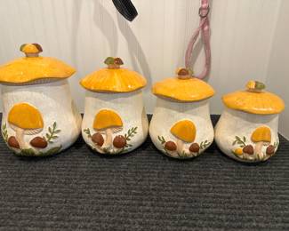 #261 Ansels Brand Set of 4 Mushroom Cannisters  (as is small chip)   $100