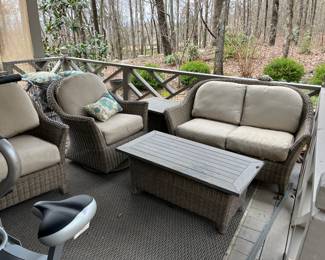 #235 (5) piece Plastic wicker patio set (higher end) with Sunbrella cushions, with loveseat 42 long, glider rock chair, stationary chair, end table 22x22x22 and coffee table 44x22x18	 $500.00 
