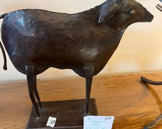 #38	Vtg. Metal Folk Art Steer - 13"H x 12.5" x 3.75"	 $30.00 			
