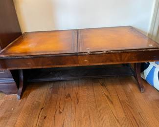 #15	Table 	Antique Coffee Table w/2 glass protects w/leather top - 40x22x15 (as is finish)	 $50.00 
