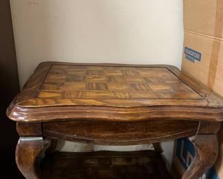#97	Trailer	Two end tables with Queen Anne feet, oak inlay.  26x20x20.  Set	 $60.00 			
