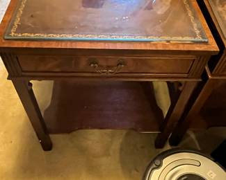 #187	Table	Genuine Mahogony leather top square end table with one drawer, protective glass top.  21 x21 23 As is leather.  Set of two.	 $150.00 			

