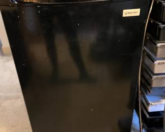 #195	Magic Chef tall dorm frig, black.  19x21x34	 $50.00 
