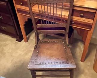 #183  Antique leather seat with nail head, odd chair.	 $25.00 
