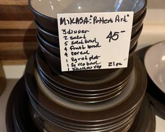 #145	China	Mikasa potters art 21 piece stone wear set, brown and blue	 $45.00 			
