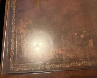 #187	Table	Genuine Mahogony leather top square end table with one drawer, protective glass top.  21 x21 23 As is leather.  Set of two.	 $150.00 			
