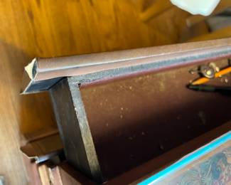 #47	Table 	Side Table (looks like 4 books) w/glass top w/design on top - 20x14x21.5 as is	 $75.00 			
