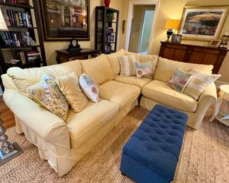 Yellow and white striped slipcovered sectional
