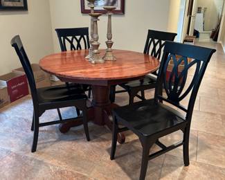Round dining table with 4 chairs by Pier 1 Imports