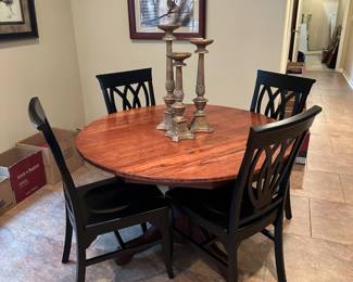 Round dining table with 4 chairs by Pier 1 Imports