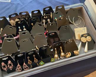 Lots of jewelry including vintage Trifari, Monet, Michael Kors, Sarah Coventry, Kendra Scott, and more! 