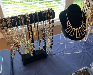 Lots of jewelry including vintage Trifari, Monet, Michael Kors, Sarah Coventry, Kendra Scott, and more! 