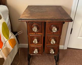 Antique 6-drawer wood and iron side table