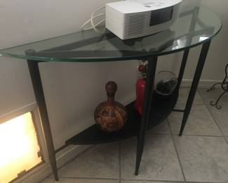Half-moon glass sofa table