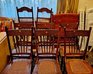 Wooden chairs with cane seats