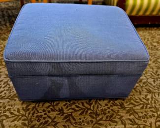 Blue contemporary footrest on wheels