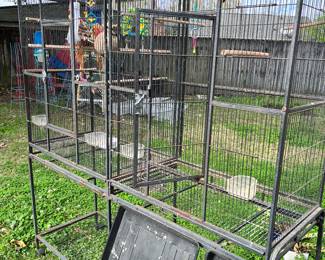 very large bird cage for many birds or big birds has a divider