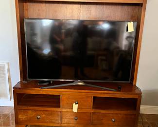 Samsung 60” tv. 
TV cabinet. 