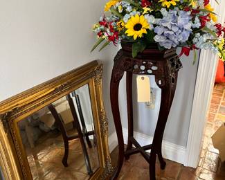 Ornate mirror. 
Mahogany fern stand. 